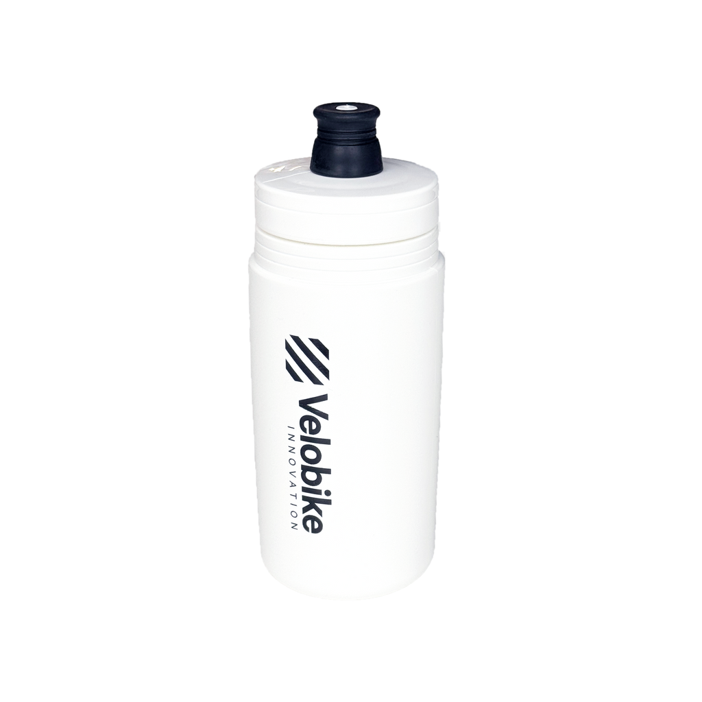 A white plastic water bottle with a black top cap and a black Velobike Innovation logo printed vertically on the front, set against a plain white background.
