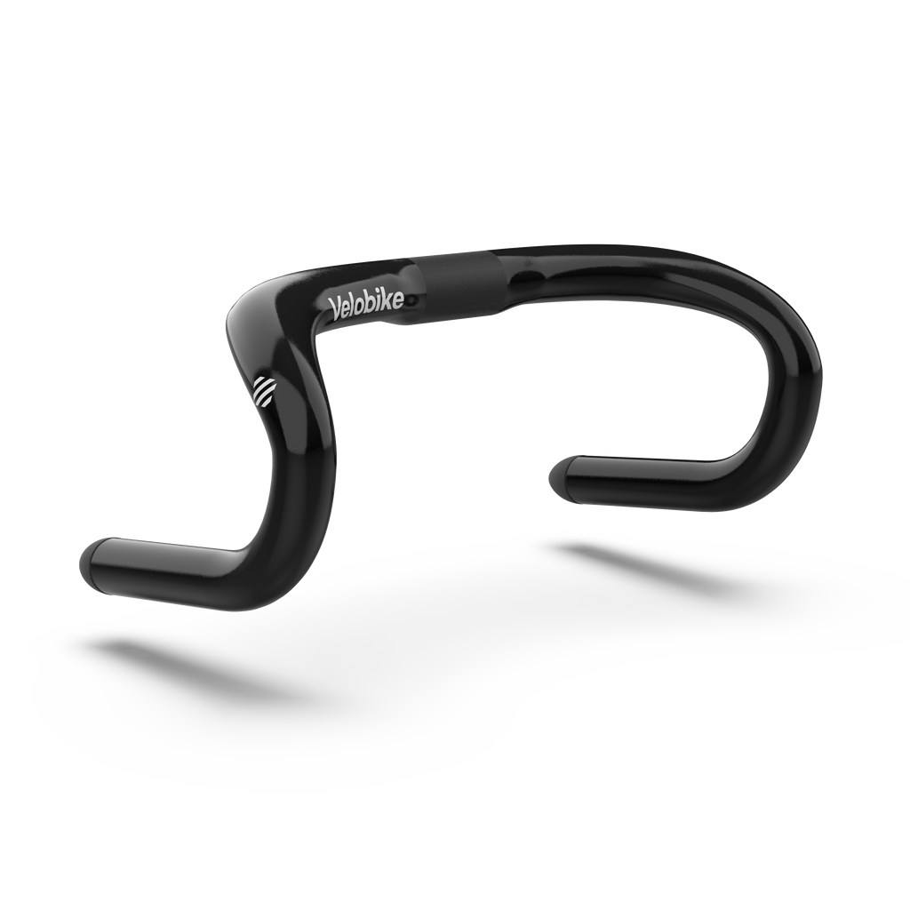 A glossy black drop track sprinting handlebar with the 'Velobike' brand name printed in white on the upper left section, shown against a clean white background with a soft shadow underneath.